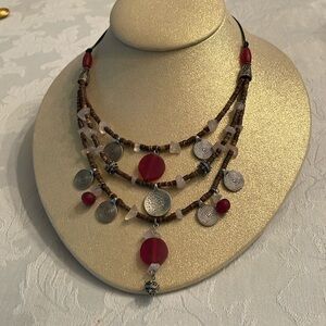 Multi strand statement necklace with beads , acrylic stones and silver accents